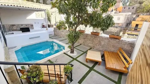 exterior-alberca-un_lugar_para_disfrutar_con_familia_y_amigos